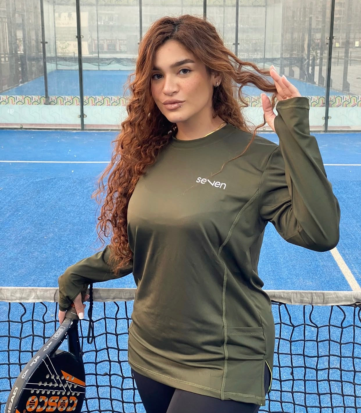 unique olive oversized top with pocket